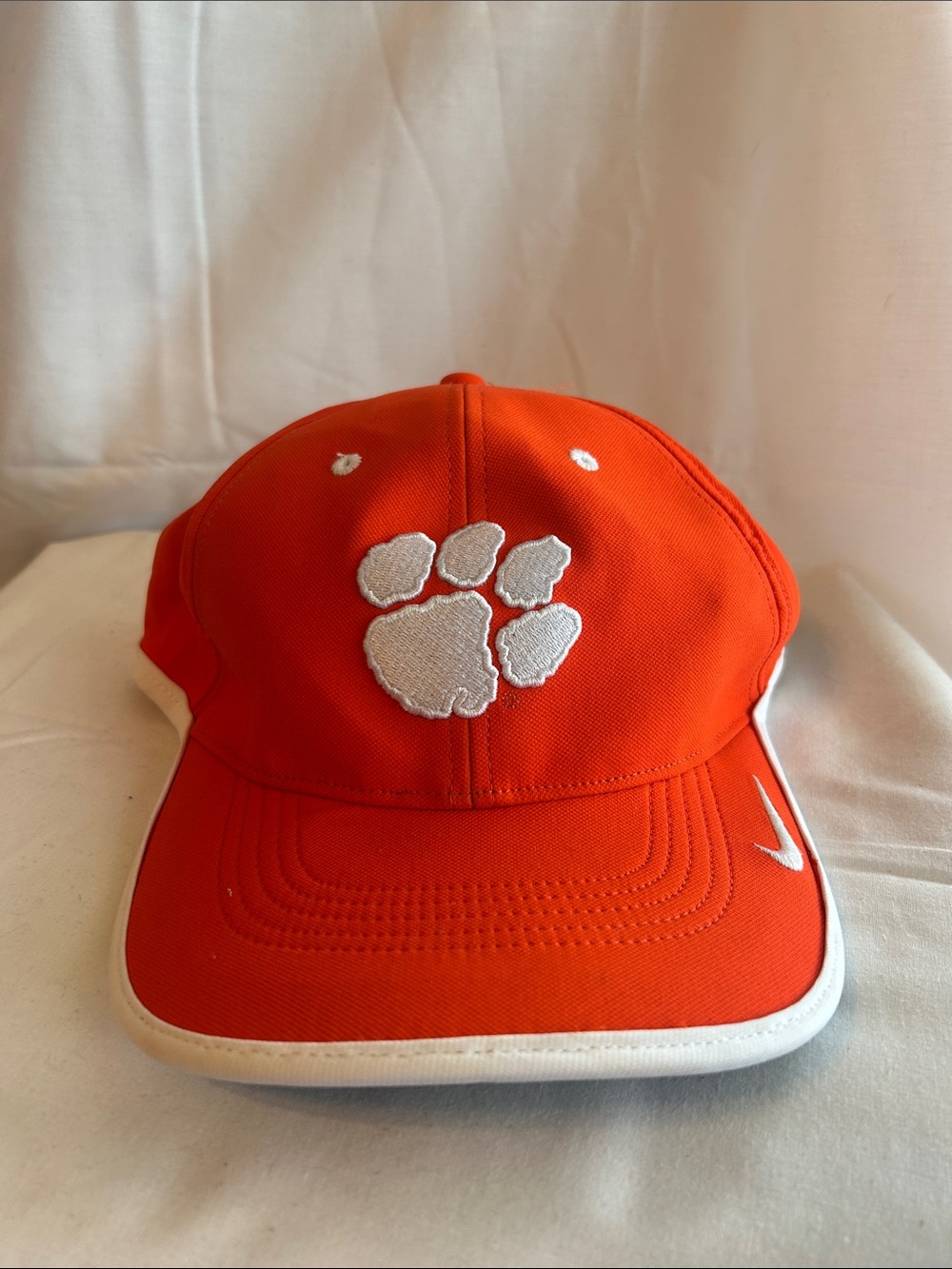 Nike Men’s Orange Cap with White Paw Logo